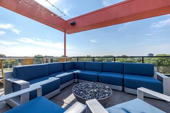 Hello apartments sky deck with fire pit lounge